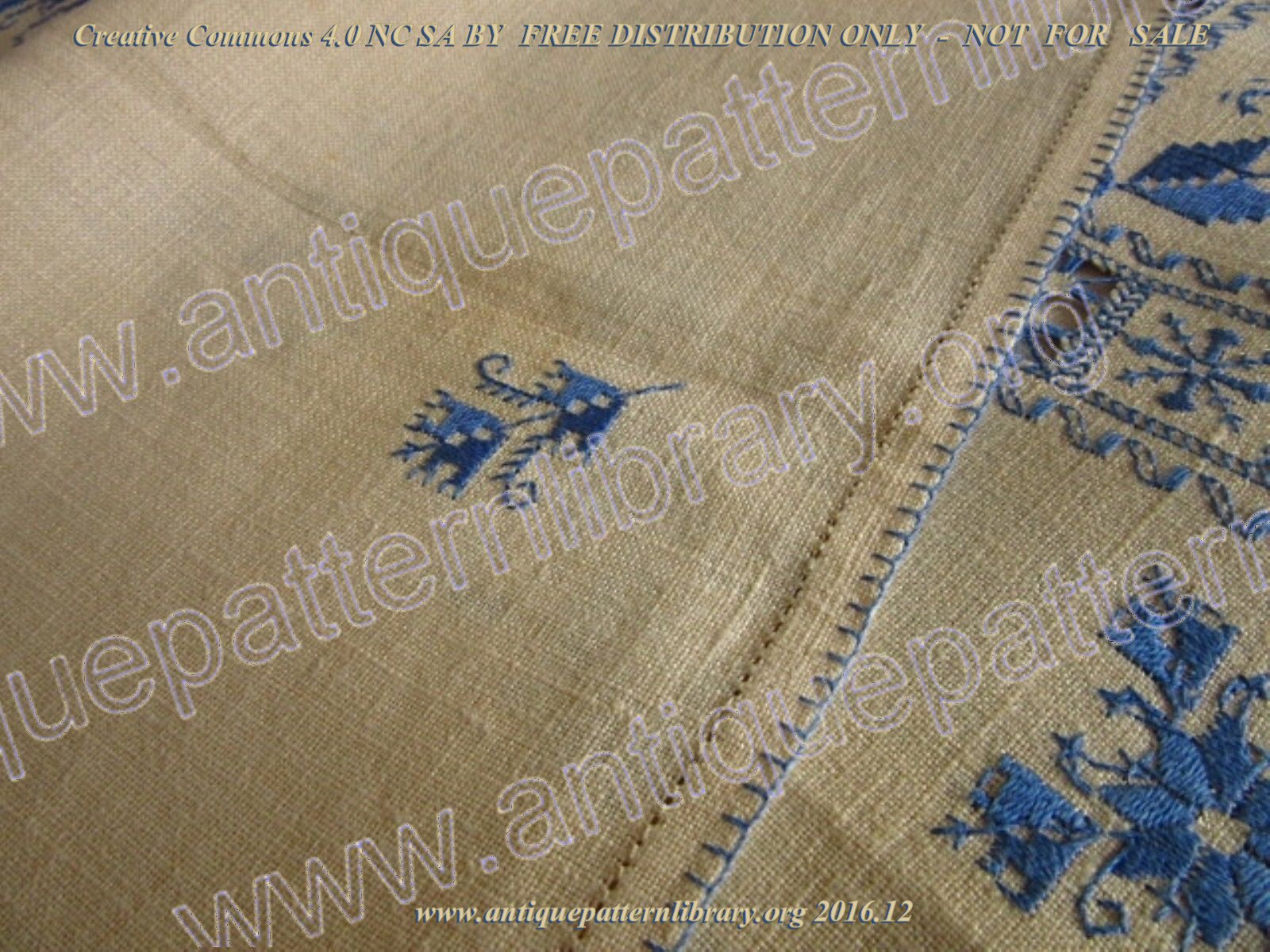 F-LU001 Table linen embroidered in blue with punto antico 